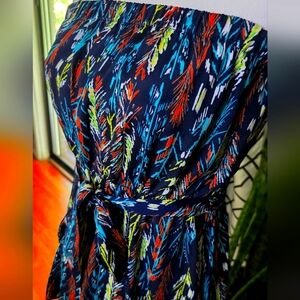 Halter top dress with a cinch waist and original matching belt.